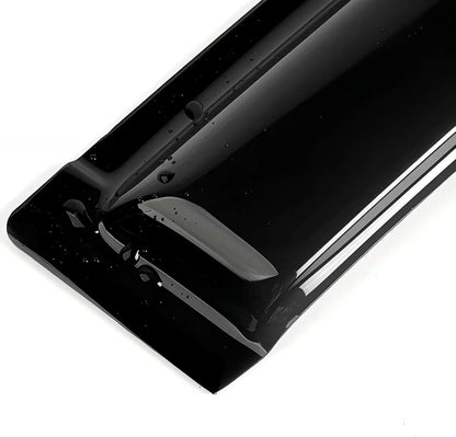 Close-up detail of smoke tape-on window visor rain guard with glossy plastic finish