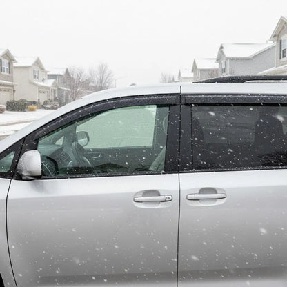 2011-2020 Toyota Sienna with smoke window visor rain guards installed in snowy weather
