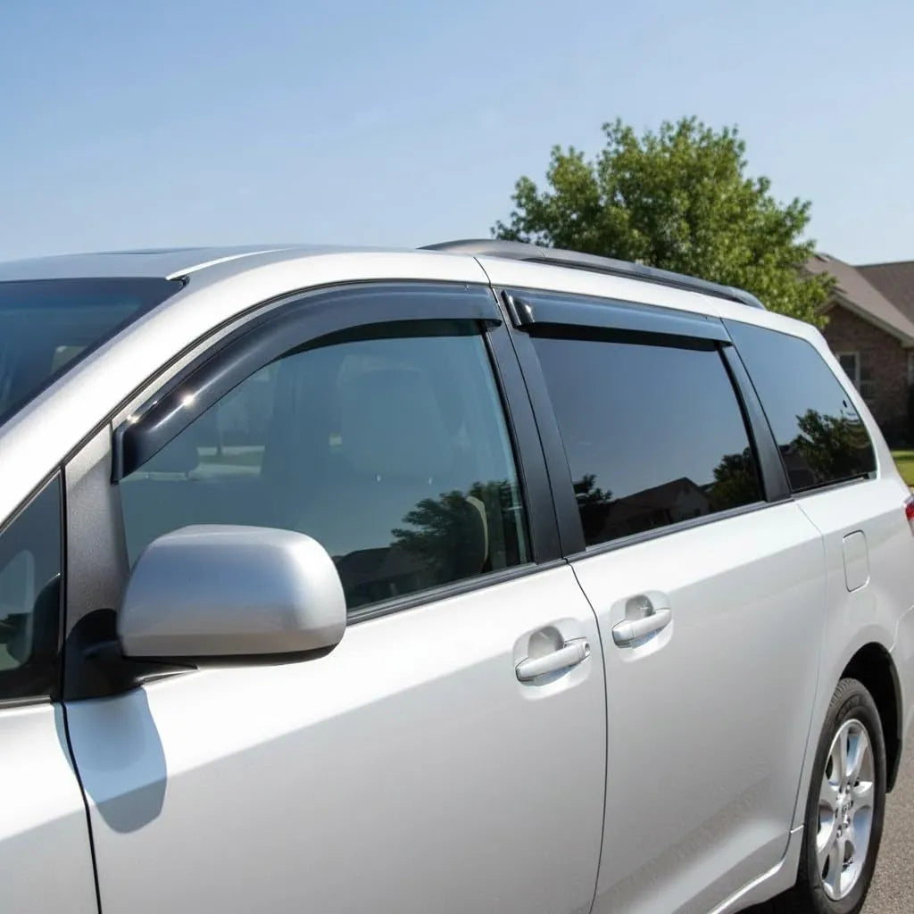 Toyota Sienna smoke tape-on window vent deflectors installed for sun shade and fresh air
