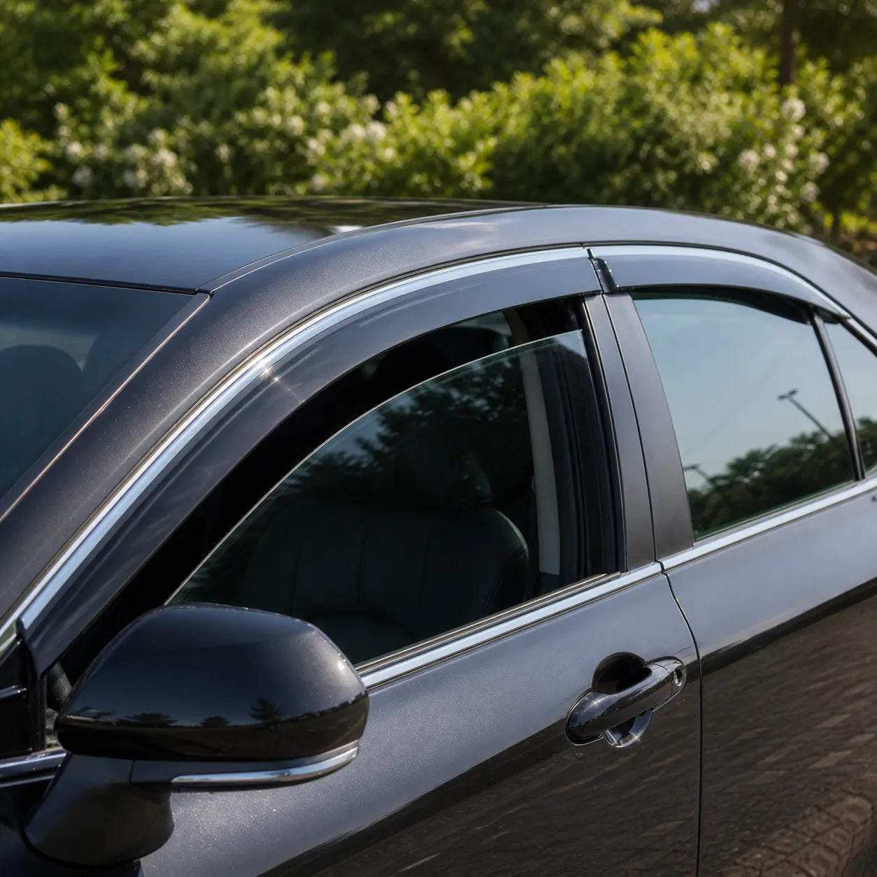 Toyota Camry smoke tape-on window visor rain guards installed for sun shade and fresh air