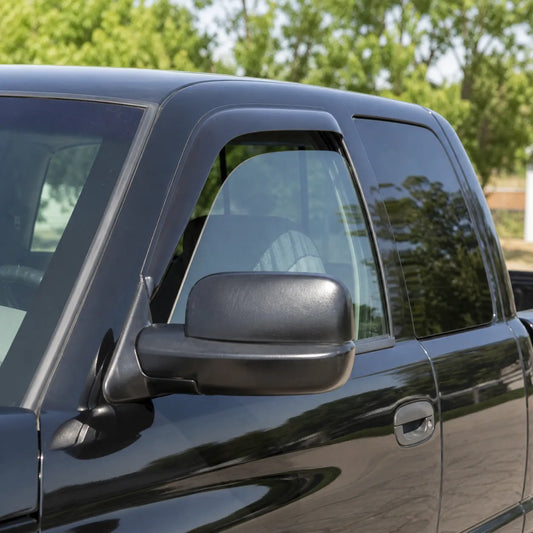 Dodge Ram Quad Cab with smoke in-channel window visor rain guards installed on front door windows