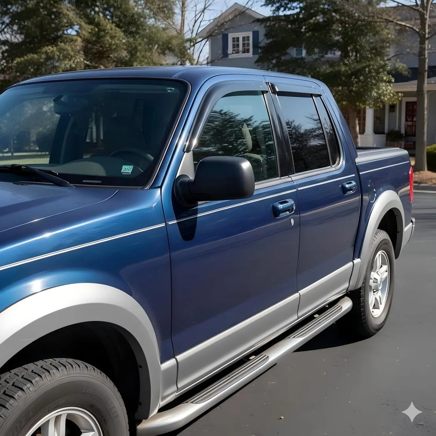 1991-2001 Ford Explorer smoke in-channel window vent deflectors installed on blue SUV
