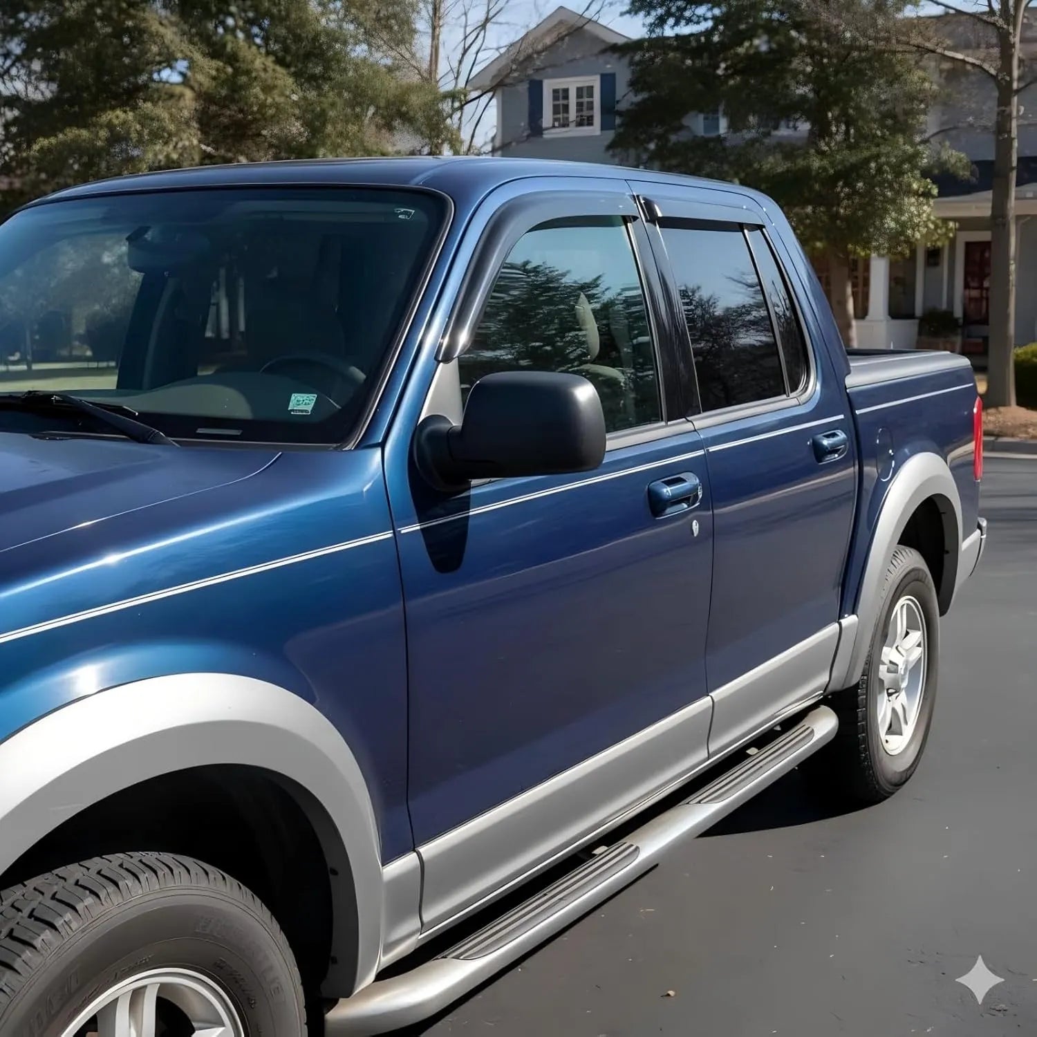 1991-2001 Ford Explorer smoke in-channel window vent deflectors installed on blue SUV
