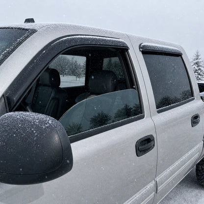Silverado Sierra Crew Cab with smoke window visor rain guards installed in rainy weather