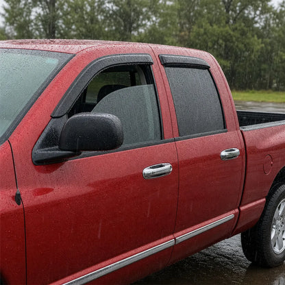 Red Dodge Ram truck with smoke window visor rain guards installed on side windows