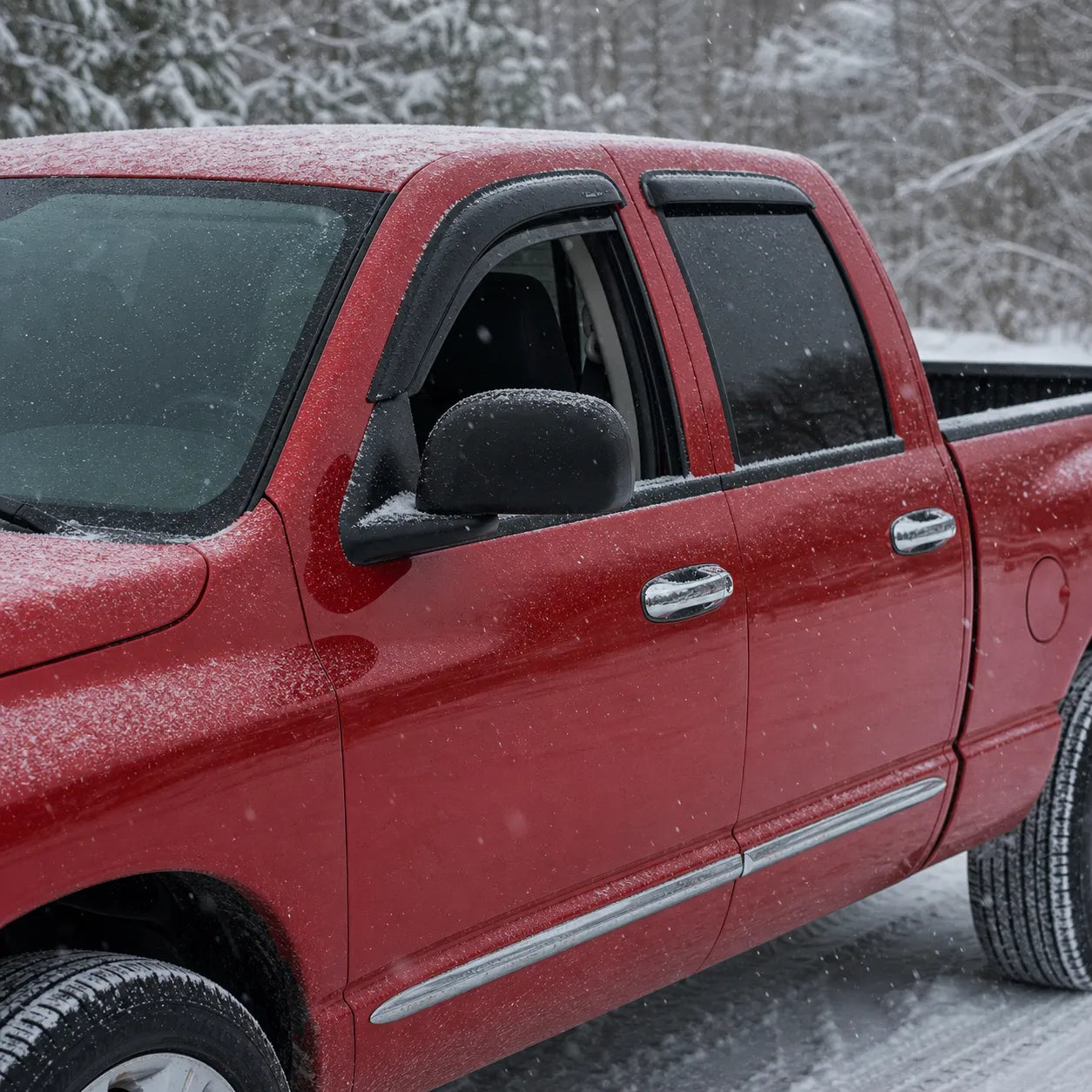 Dodge Ram Quad Crew Cab smoke window visor rain guards installed in snowy weather
